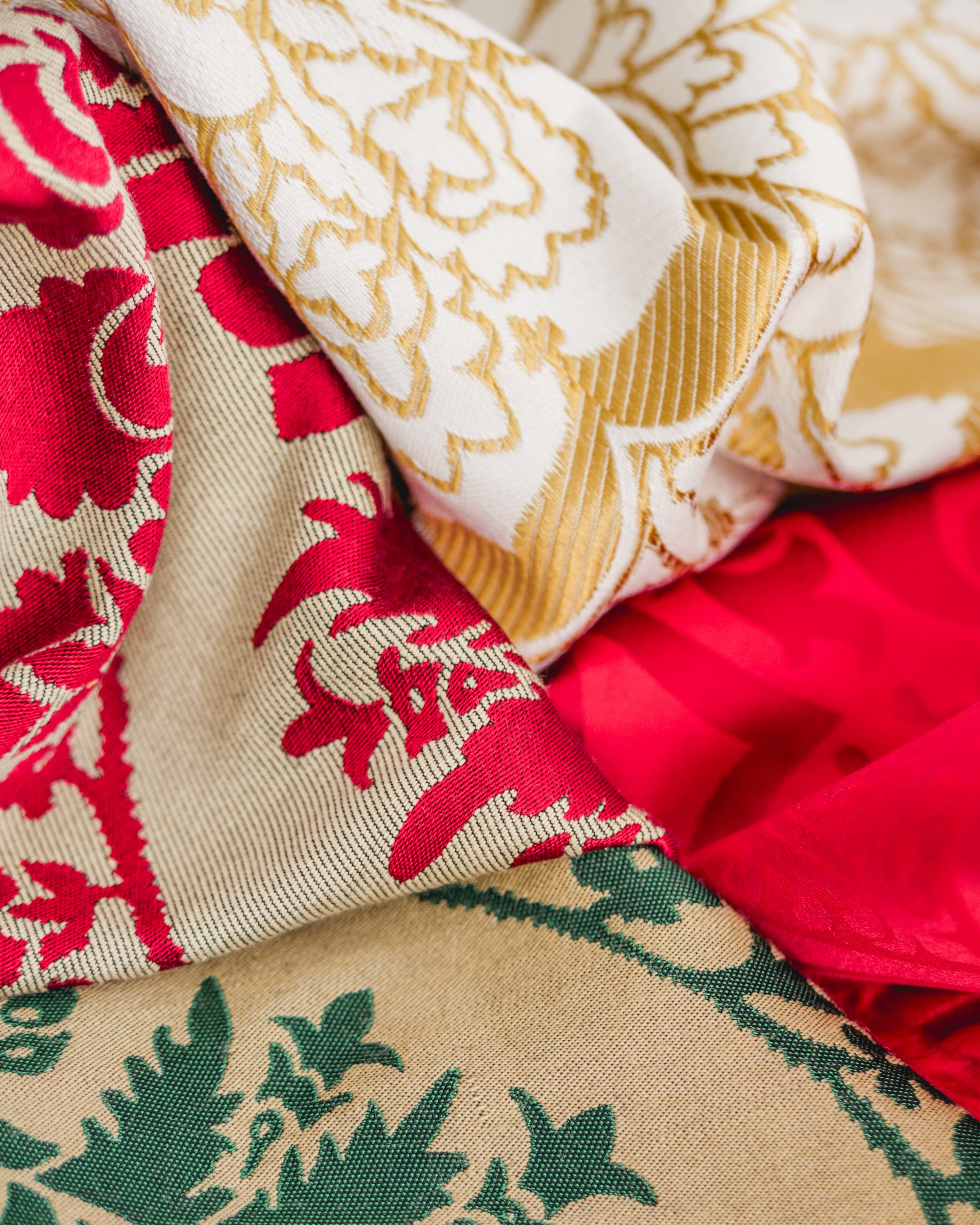 Sample fabrics in red, white, and green