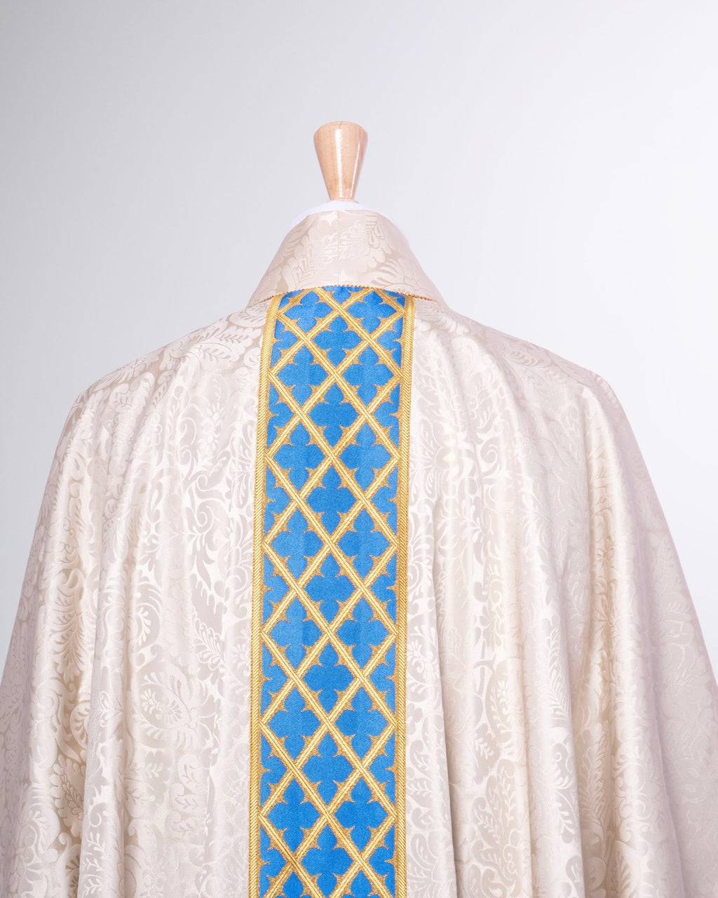 Classic Chasuble in Cream 'Holbein' with Blue Gothic Trellis Orphreys - Watts & Co.