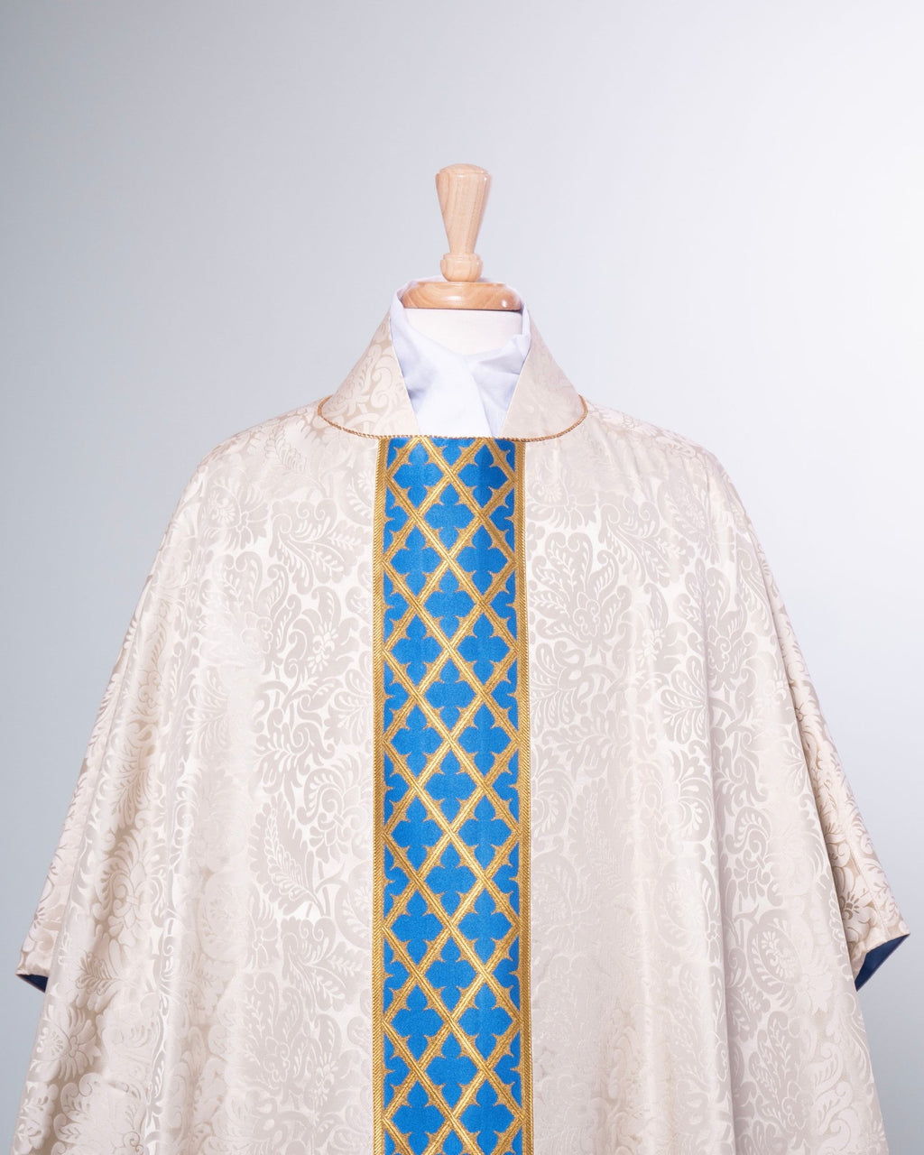 Classic Chasuble in Cream 'Holbein' with Blue Gothic Trellis Orphreys - Watts & Co.