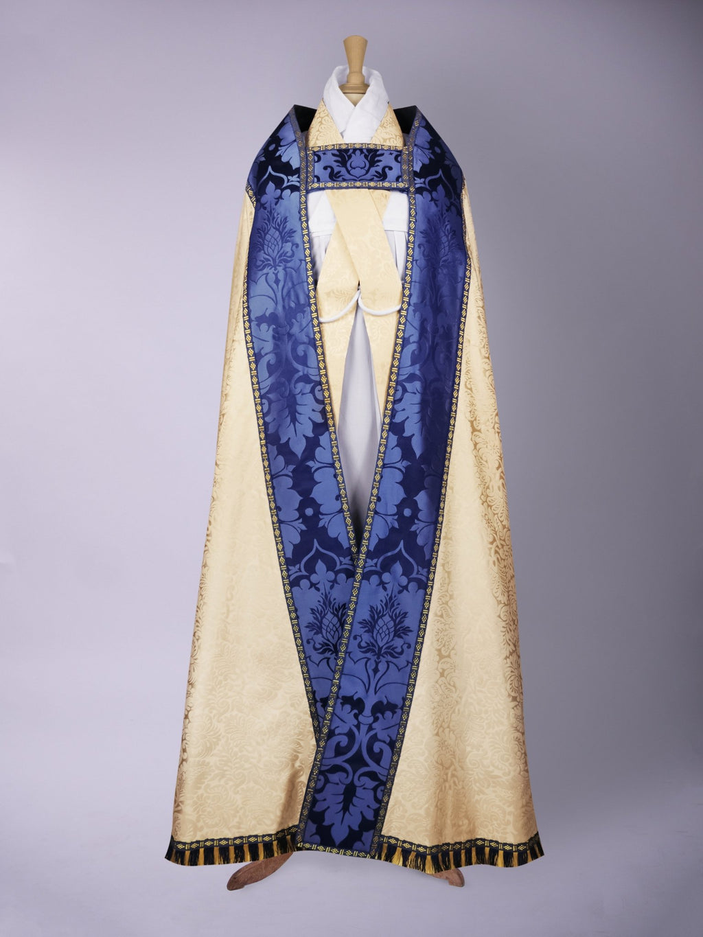 Minster Cope in Cream 'Holbein' with Blue 'Bellini' Orphreys and Sacred/Immaculate Heart Embroidered Hood - Watts & Co.