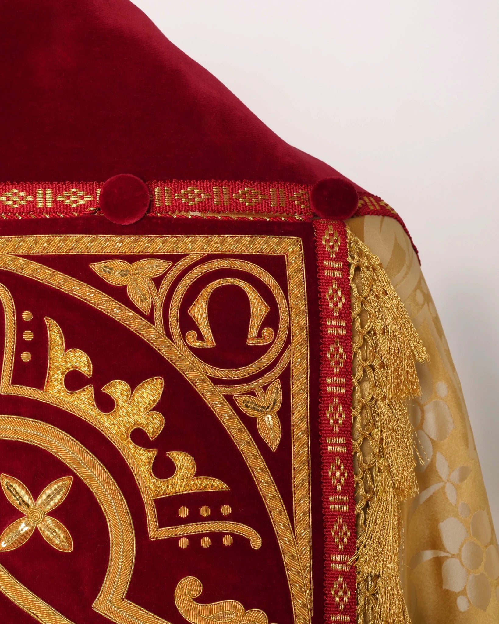 Westminster Cope in Gold/Cream 'Shrewsbury' with Berry 'Venice' Velvet orphreys and an IHS Hand - Embroidered Hood - Watts & Co.