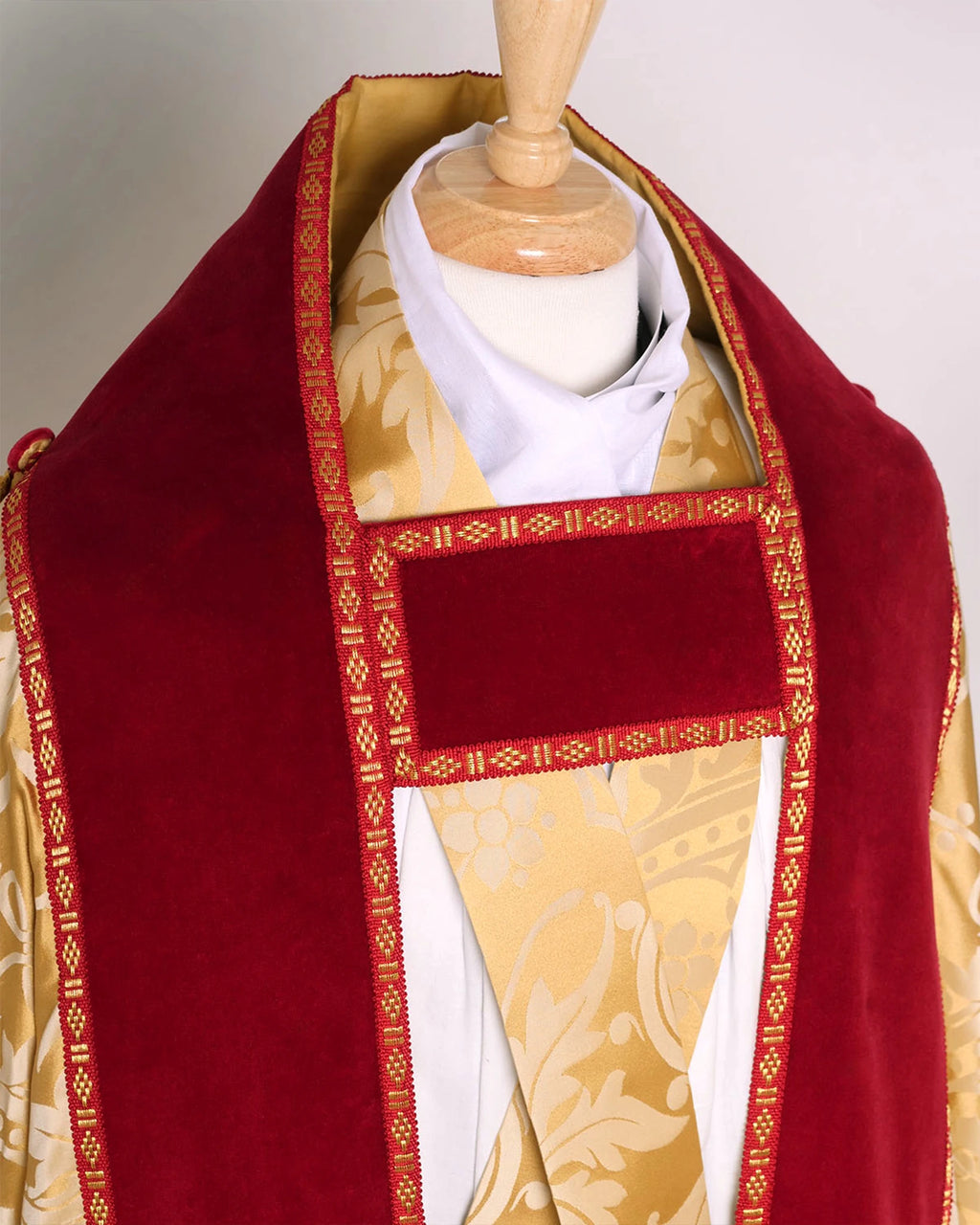 Westminster Cope in Gold/Cream 'Shrewsbury' with Berry 'Venice' Velvet orphreys and an IHS Hand - Embroidered Hood - Watts & Co.