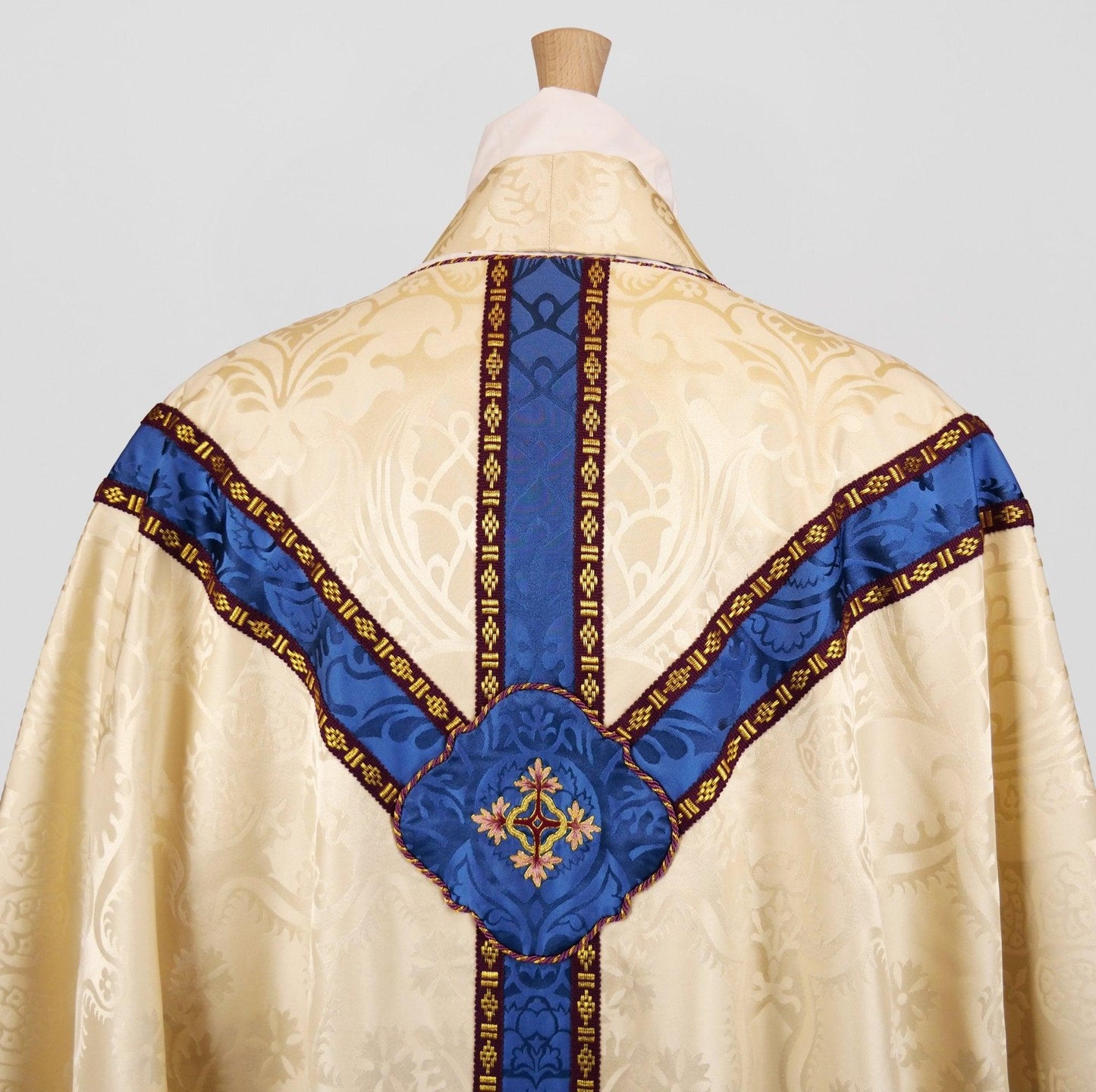 Chasuble and Stole in Cream 'Comper Cathedral' with Blue 'Comper Cathedral' Orphreys and Quatrefoil embroidery at back - Watts & Co.