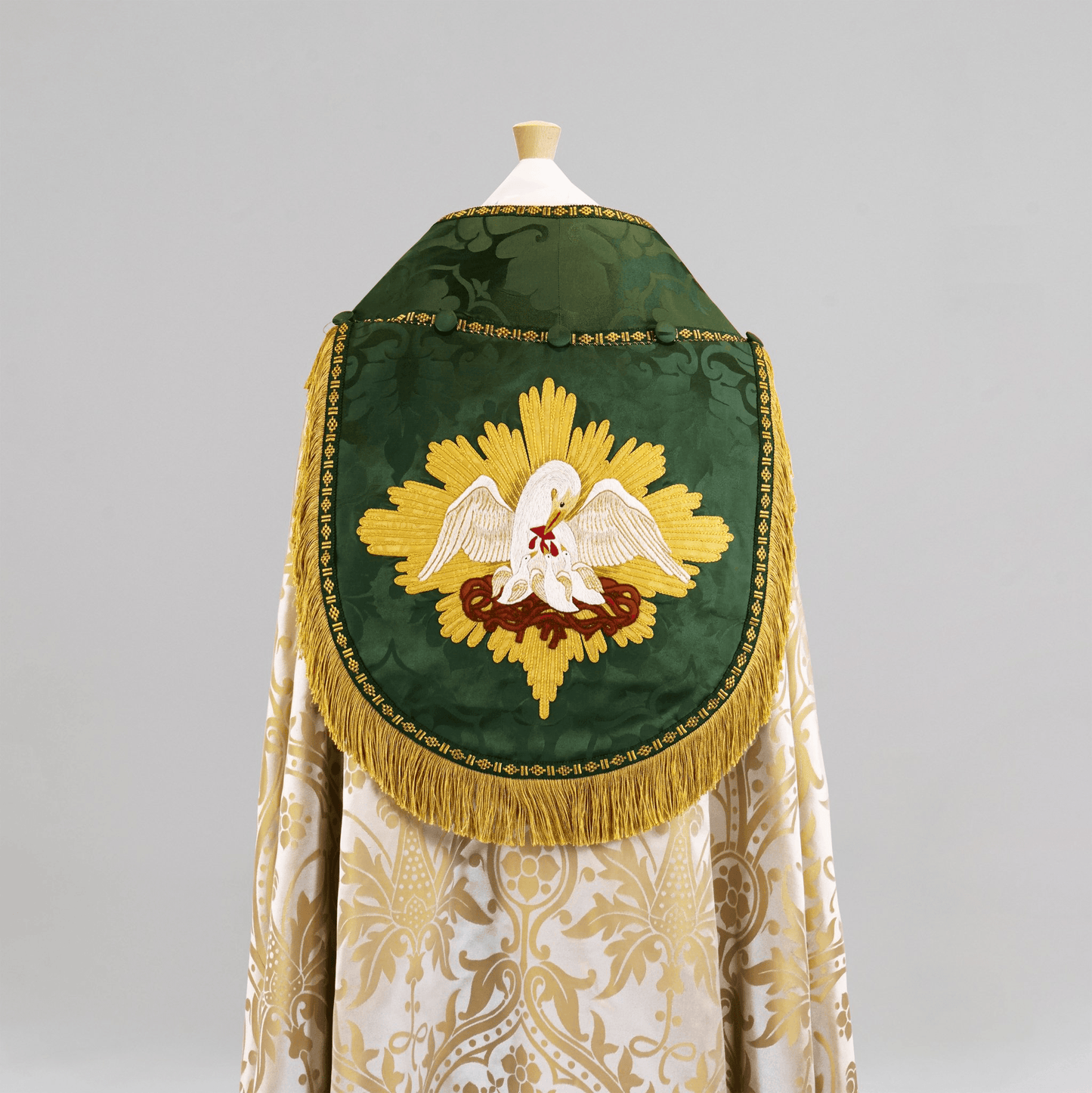 Minster Cope in Oyster 'Shrewsbury' with Green 'Bellini' Orphreys, Hood, and Morse and Pelican Embroidery